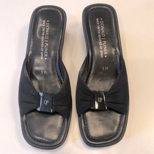 Donald J Pilner black slides